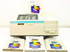 Beckman DU-65 UV-Visible Spectrophotometer front view with manuals and Beckman software module binders displayed in front