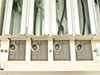 Bottom rear panel showing four channel Signal Input and Monitor circular connectors with 1 OUT and GUARD terminals
