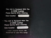 Olite AL100 interior lamp labels showing L1250 lamp specification and note that power supply must be modified to use this lamp
