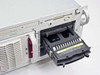 Compaq ProLiant 6400R hot-plug drive carrier pulled open showing empty drive sled with caution label