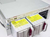 Compaq ProLiant 6400R with both hot-plug power supply units pulled out and visible — top view