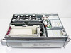 Compaq ProLiant 6400R interior top view with chassis open showing CPU module area, memory boards, and PCI riser