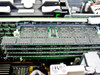 Compaq ProLiant 6400R memory board close-up showing multiple DIMM slots populated with RAM modules, Korea-stamped chips