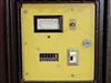 LP Associates 8510 Xelamp — front control panel close-up showing DC Amperes analog meter (0-125A scale), AUTO/MAIN toggle switch, key switch, hours-and-tenths counter reading 18242, and ON/OFF toggle switch