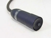 University Sound US649B lavalier microphone – front capsule grille view with label reading 'Dynamic Omni, Made in USA'
