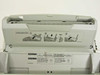 Panasonic KX-FL511 top document input tray open showing blank paper loading instructions and fax operating guide stickers