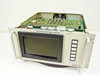Hughes 3878529-100 Station Status and Control Module – top-open view showing internal PCB stack and front panel display assembly