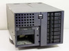 Dell PowerEdge 6400 tower server front view — CD-ROM drive, open floppy bay, and 8-bay SCSI drive cage with drives installed