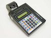 Hypercom T7P-T credit card terminal front-left view showing keypad, LCD display, integrated receipt printer, and RBSLynk branding