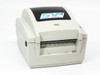 Toshiba TEC B-SV4D-GS10-QM thermal label printer – front and left side view showing SV4 logo and TEC branding