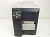 Zebra Z4 label printer front-left view with cover closed showing LCD control panel and label exit