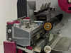 Zebra Z4 label printer internal printhead and ribbon mechanism close-up showing printhead assembly and ribbon path