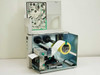 Zebra TLP2746E fully open showing internal media compartment – label roll loaded, ribbon spindles, and cover diagram