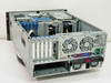 HP ProLiant ML370 tower server – angled rear-left view showing motherboard, PCI expansion slots, redundant power supply, and rear fan housings