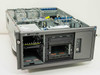 HP ProLiant ML370 tower server – angled front-left view with side panel removed showing empty drive bays and CD-R drive