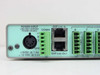 Sound Control Technologies ASP-8x8 rear panel close-up – POWER INPUT label showing +5VDC @ 1.5A and ±12VDC @ 0.2A, 5-pin DIN connector, COMM port, and DSP Link In/Out RJ ports