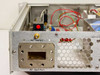 Varian VZC6961D7G1 rear panel showing SMA RF INPUT connector, waveguide RF OUTPUT port, and ventilation grille