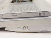 Sony Vaio PCV-W510G opposite side edge showing DVD drive slot and UNLOCK latch mechanism