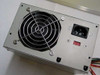 Compaq 334169-001 ATX power supply – rear panel showing IEC AC inlet, cooling fan, and voltage selector switch