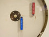 Interior chart disc view showing Temperature pen (red label) and Humidity pen (blue label) arms on circular chart