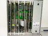 PictureTel S4000 interior view with card cage fully populated – multiple green PCBs installed and Onan power supply visible on right side