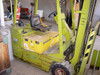 Clark TW30B forklift — right rear view showing body wear, paint fading, and overall condition in warehouse