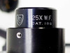 American Optical 25X Wide Field eyepiece/optic, Cat. 186 — close-up of engraved markings on black anodized barrel