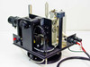 Oriel arc lamp assembly — rear 3/4 view with enclosure panels removed showing lamp carriage, vertical stage, and cable routing