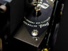 PHD Actuator label close-up — black anodized plate with 'PHD Actuator — Products for Productivity' engraved text