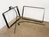 OmniMount ARC-FPD swivel LCD wall mount — two incomplete frame assemblies and mounting arms on floor