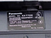 Panasonic KX-T7220 rating label showing model number, Part No. T11310ZA, UL listing, and Made in U.K.
