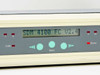 Astrocom 4100 front panel display showing SDM 4100 FC V2.4 firmware, navigation buttons, and port indicator LEDs 7–10
