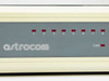 Astrocom 4100 front panel left side showing Astrocom logo, port LEDs 1–8, and Link indicator LED