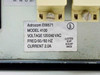 Astrocom 4100 UL rating label showing model 4100, voltage 120/240VAC, frequency 50/60Hz, current 2.0A, UL listed EDP Equip E68571