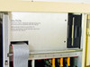 Opcom D.I.A.L. interior card cage detail – caution label, ribbon cable, and numbered card slots 2 through 8 with module cards installed