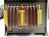 Interior view of power supply heatsink assembly showing Dale wirewound power resistors mounted on aluminum fin heatsink