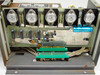 Interior of Thermco power supply chassis showing five Motorola MJ1000 NPN power transistors on heatsink rail, green PCB with ICs and terminal strips, and large electrolytic capacitor