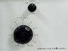 BAM-2-400 front panel close-up — Polarity selector switch (POS / TRANSIT / NEG) and large Voltage Control rotary knob scaled 0–100