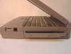 Toshiba Tecra 750CDT left side view showing CD-ROM drive bay and left-side expansion port connector