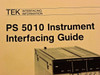 Close-up of Tektronix PS5010 Instrument Interfacing Guide cover with TEK GPIB Made Easy header and power supply photo
