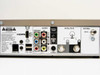 DirecTV HR10-250 rear panel close-up showing HDMI, component YPbPr outputs, A/V composite outputs, digital audio, S-Video, dual satellite coaxial inputs, antenna RF input, USB, phone line, and serial ports