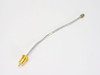 KMW 140223-2 Rev 2 RF coaxial cable assembly full view — braided stainless jacket, SMA male connector at right, gold panel-mount male connector at left