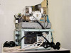 Guzik S1701 SpinStand rear and underside view showing granite base, cooling fan, interconnect wiring, and Guzik Technical Enterprises chassis label