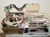 Guzik S1701 SpinStand top view showing full spindle assembly, linear slide mechanism, actuator arm, PCBs, and carbon fiber cable guide