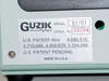 Guzik S1701 SpinStand identification label showing Model S1701, Serial No. 30204, patent numbers, and Made in U.S.A.