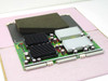 Silicon Graphics SGI 305X2 Power Module Board 030-0743-002 – top view showing dual black and silver heatsink arrays on green PCB with foam anti-static pads