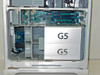 Apple Power Mac G5 A1047 interior — open side panel showing dual G5 processor covers, logic board, and empty RAM/PCI-X slots