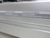 Apple Power Mac G5 A1047 bottom label — showing serial number, power rating 100-120V/200-240V 6.5A/3.5A 50-60Hz, Ethernet ID, and 2.5GHz DP configuration string