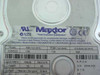 Maxtor 90645D3 label close-up showing model number, cylinder/head/sector specs, jumper settings, and voltage ratings