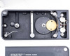 Photo-Sonics LB-24A magazine interior – top view showing film transport rollers, brass drive gear, sprockets, and film path guides